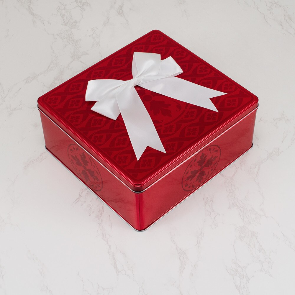 chocolate and fruit cookies in red metal box